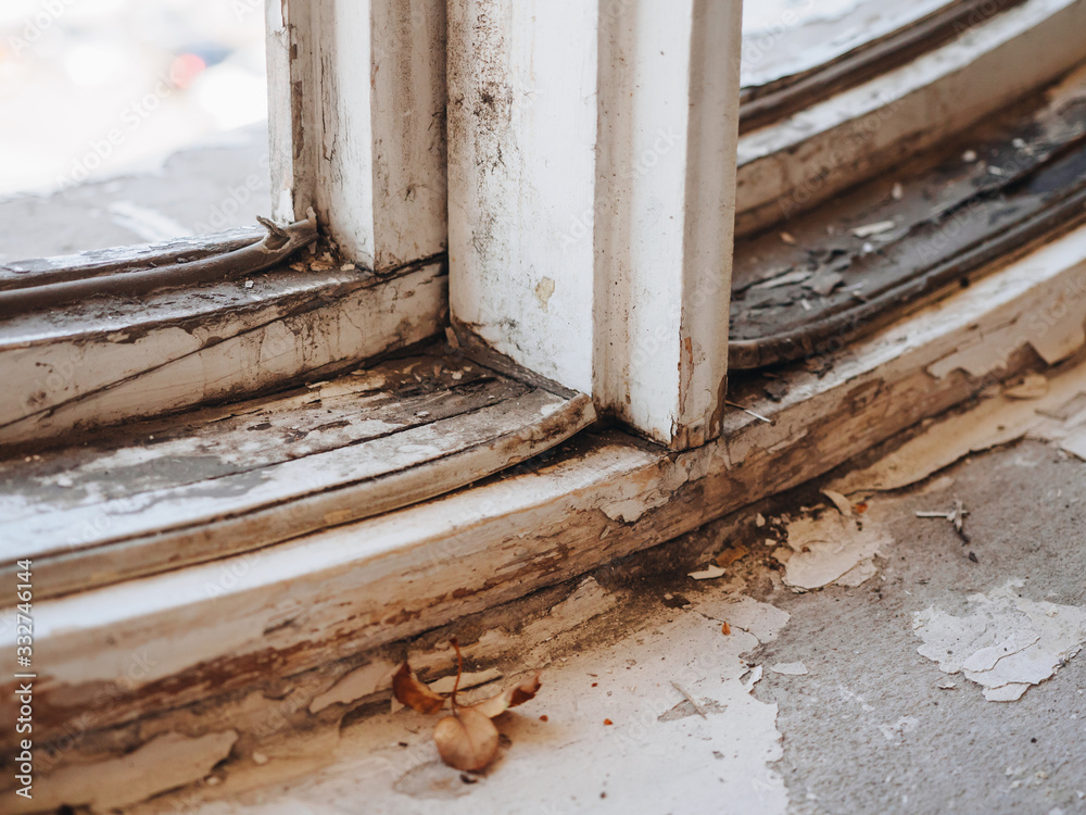Old dirt rotten wooden retro white window Old dirt rotten wooden retro white window