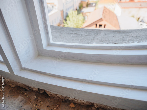 Old white wooden window restoration renovation recovery