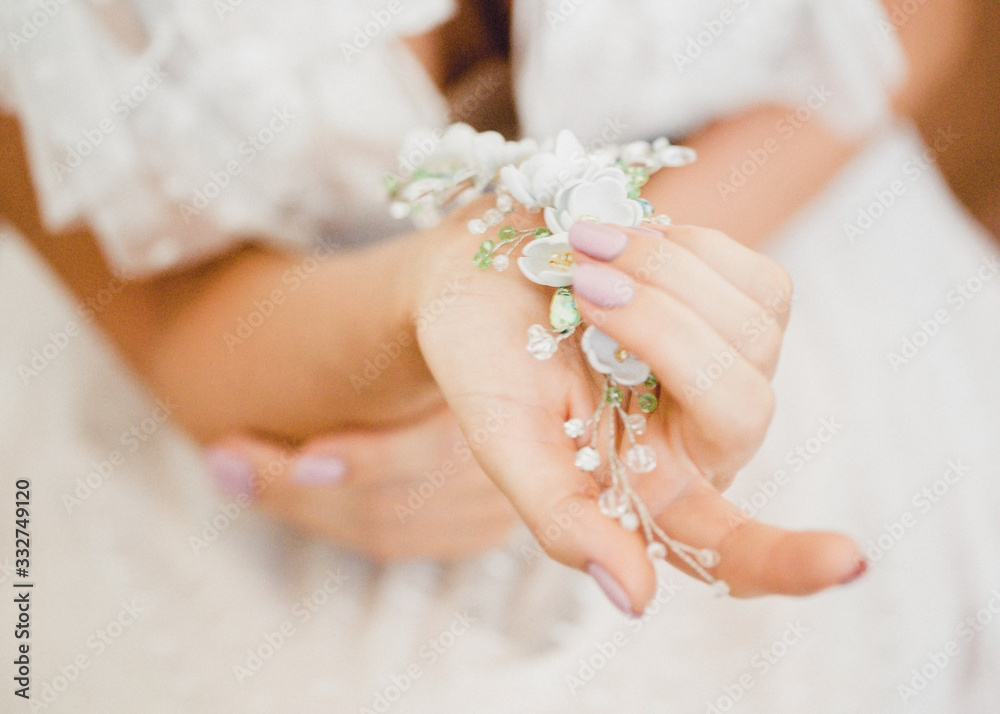 Hands with jewelry, beautiful wedding background 