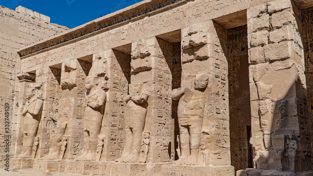 Temple of Medinet Habu. Egypt, Luxor. The Mortuary Temple of Ramesses III at Medinet Habu is an important New Kingdom period structure in the West Bank of Luxor in Egypt. Temple of Medinet Habu. Egypt, Luxor. The Mortuary Temple of Ramesses III at Medinet Habu is an important New Kingdom period structure in the West Bank of Luxor in Egypt.