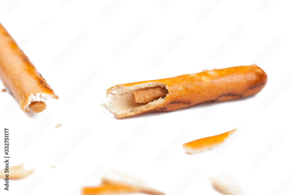 Salty cracker pretzel sticks isolated on white background.Copy space Salty cracker pretzel sticks isolated on white background.Copy space