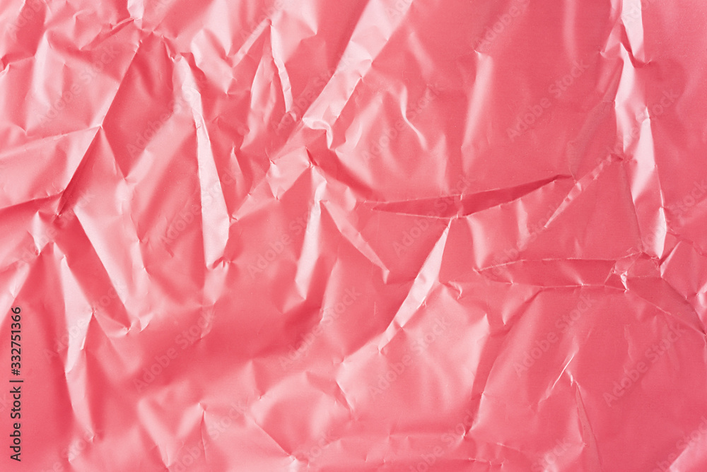 Fototapeta premium Crumpled pink gold and purple wrapping paper