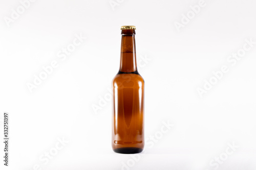 Full brown Beer Bottle Mock-up on white background.High resolution photo