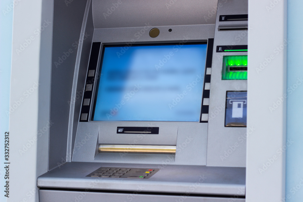 Modern street ATM machine for withdrawal of money and other financial transactions Modern street ATM machine for withdrawal of money and other financial transactions