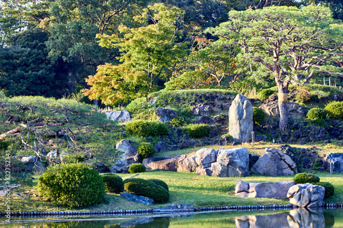 View of the lake and stones in park