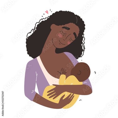 Beautiful young black african american mother breastfeeds her baby. A woman hugs a baby and feeds it with breast milk.
