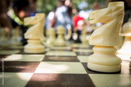 Chess pieces closeup at outdoors worshop for children