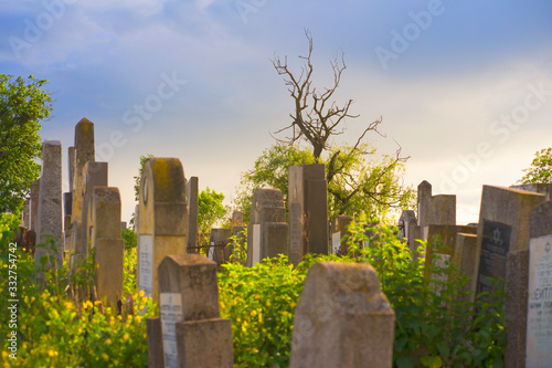 The Old Jewish cemetery at colorful sunset sky, Chernivtsi Ukraine.