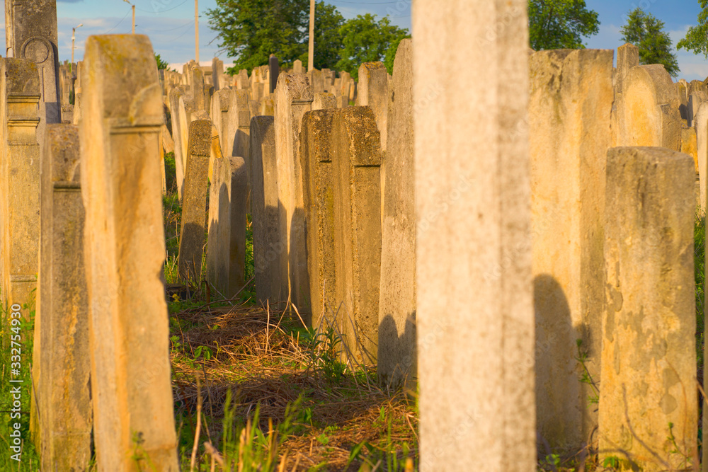 The Old Jewish cemetery at colorful sunset sky, Chernivtsi Ukraine.