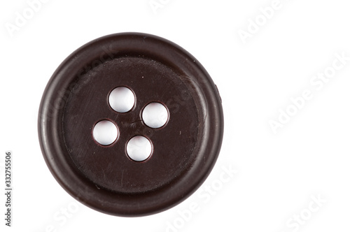 Clothes button isolated on white background. Copy space