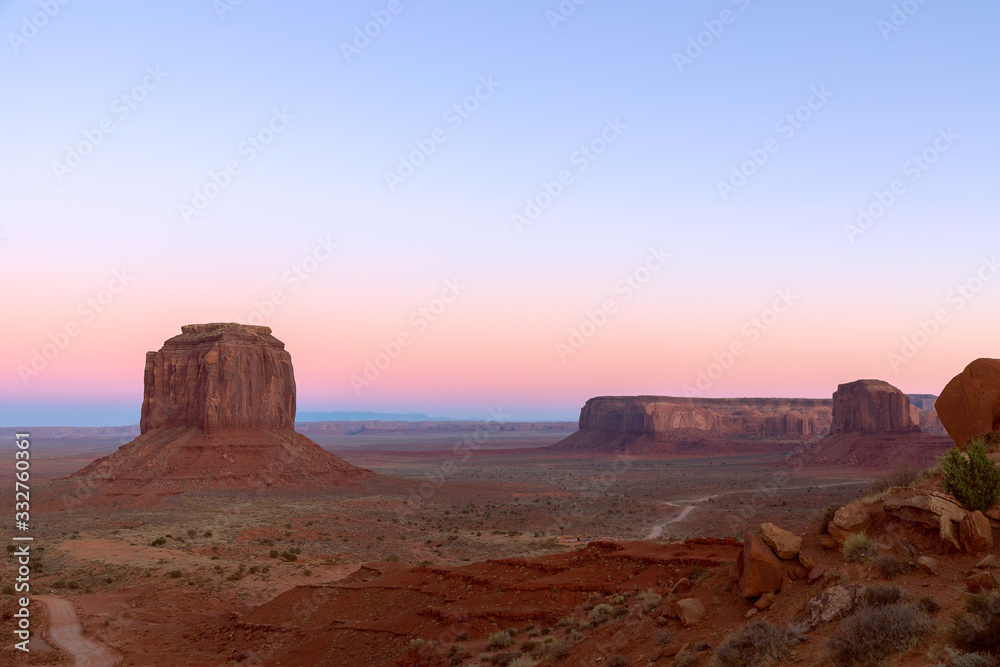 Beautiful panoramic sunset view over famous Buttes of Monument Valley on the border between Arizona and Utah, USA