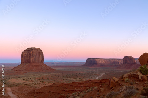 Beautiful panoramic sunset view over famous Buttes of Monument Valley on the border between Arizona and Utah  USA