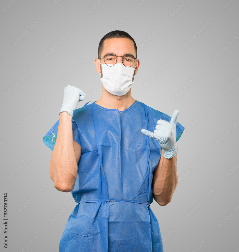 Coronavirus.Young man doing concepts and wearing mask and protective gloves Coronavirus.Young man doing concepts and wearing mask and protective gloves