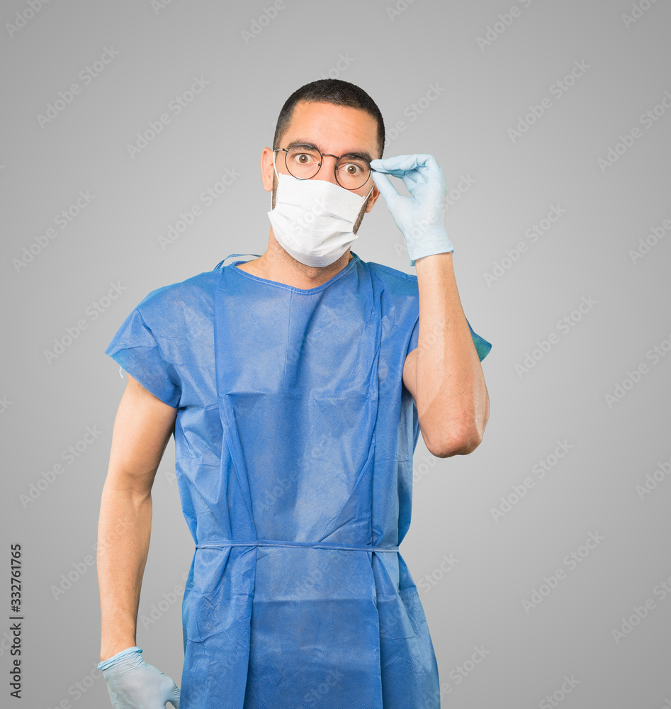 Coronavirus.Young man doing concepts and wearing mask and protective gloves Coronavirus.Young man doing concepts and wearing mask and protective gloves