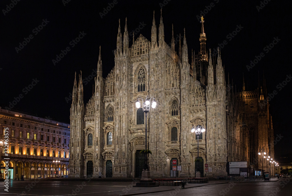 Duomo di Milano Cathedral in Duomo Square at night. (Piazza del Duomo). Milan, Italy Duomo di Milano Cathedral in Duomo Square at night. (Piazza del Duomo). Milan, Italy