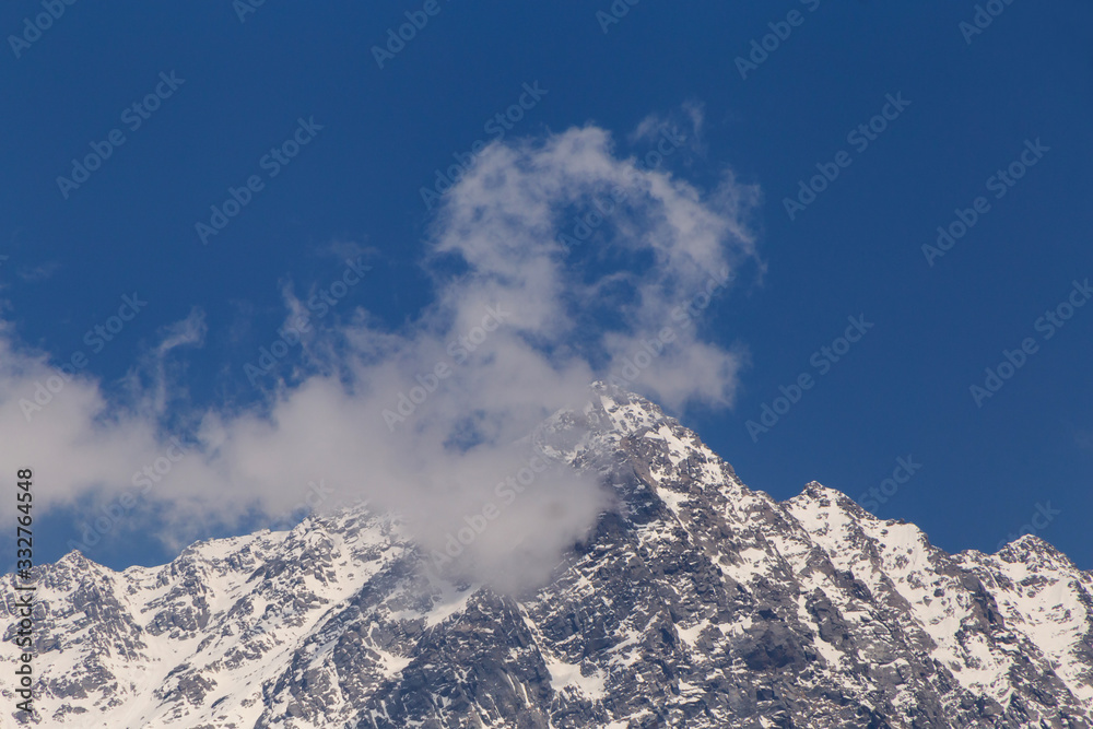 view on snowy Dhauladhar peak in Himalayas from Dharamsala, India