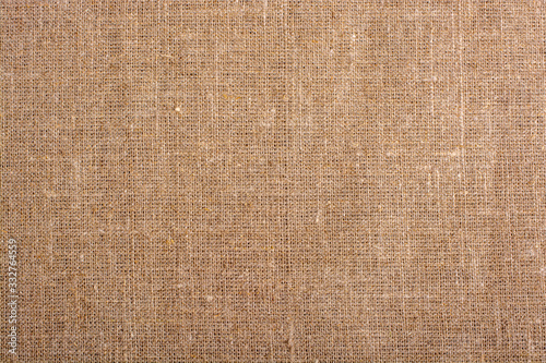 Piece of fabric old burlap texture or background