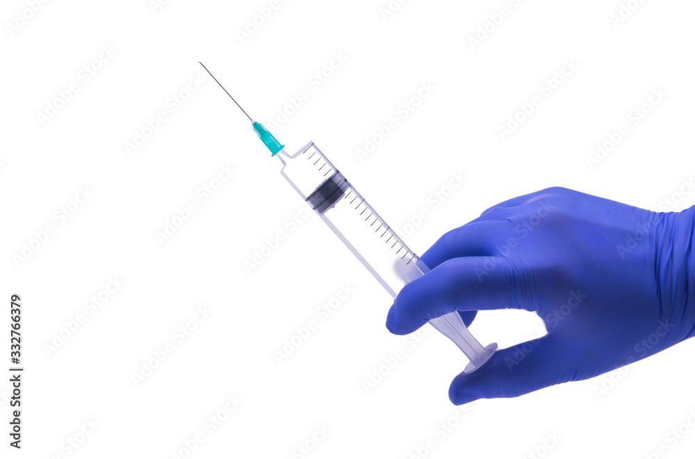 syringe in hand syringe in hand