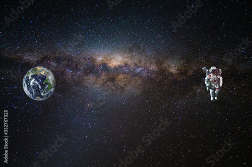 Fototapeta Naklejka Na Ścianę i Meble -  Astronaut in outer space. Elements of this image furnished by NASA.