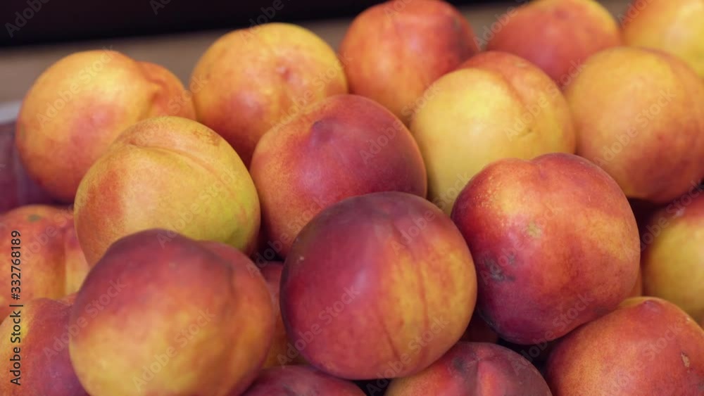 Peaches in the market on the market shelf closeup camera movement camera movement Peaches in the market on the market shelf closeup camera movement camera movement