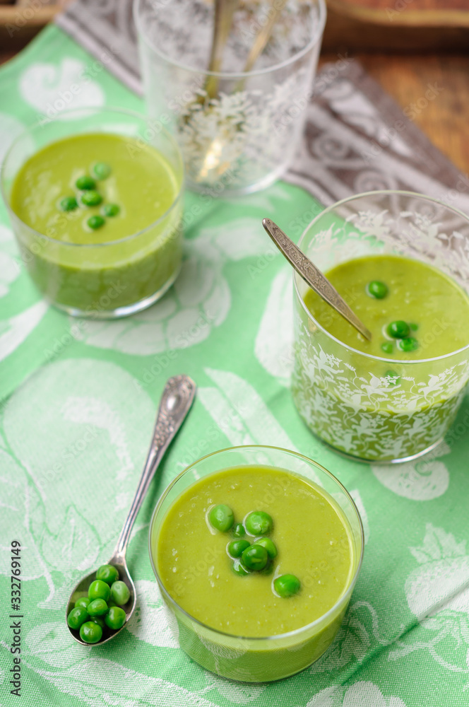 Cream of Green Pea Soup Garnished with Fresh Peas Cream of Green Pea Soup Garnished with Fresh Peas