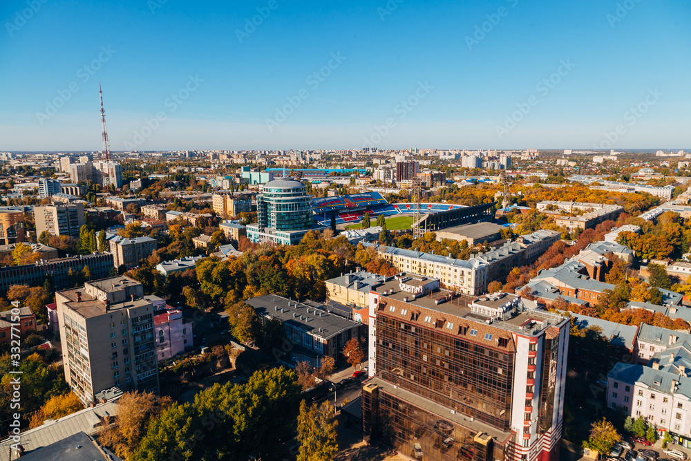 Obraz premium Sunny golden autumn Voronezh. Aerial view from skyscraper roof heigh