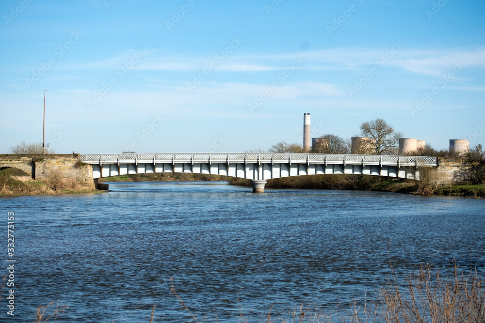Steel road bridge spanning the River Trent near Sawley, Derbyshire, UK