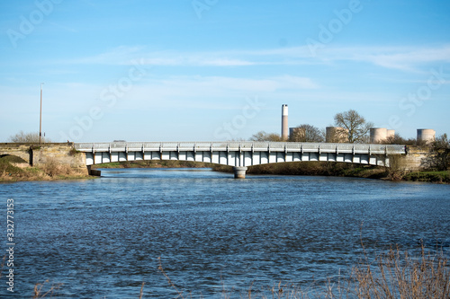 Steel road bridge spanning the River Trent near Sawley, Derbyshire, UK