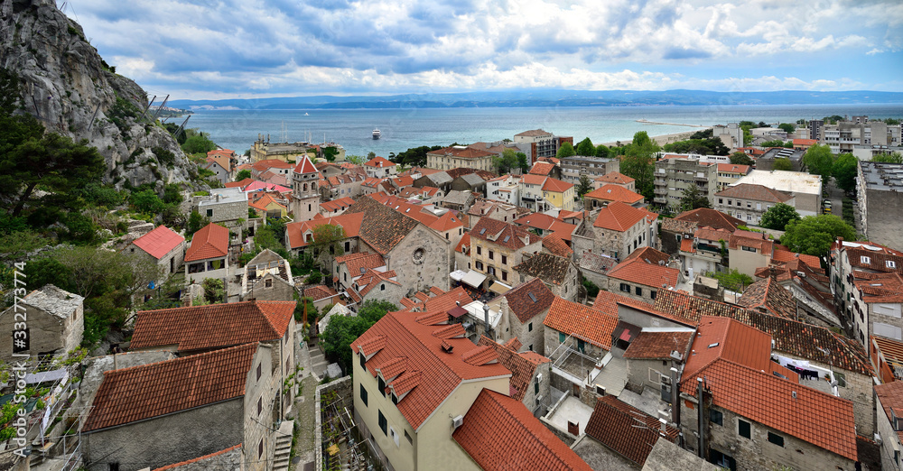 The aerial view of the coastline and old town of Omis, Croatia. Dalmatia region of Croatia