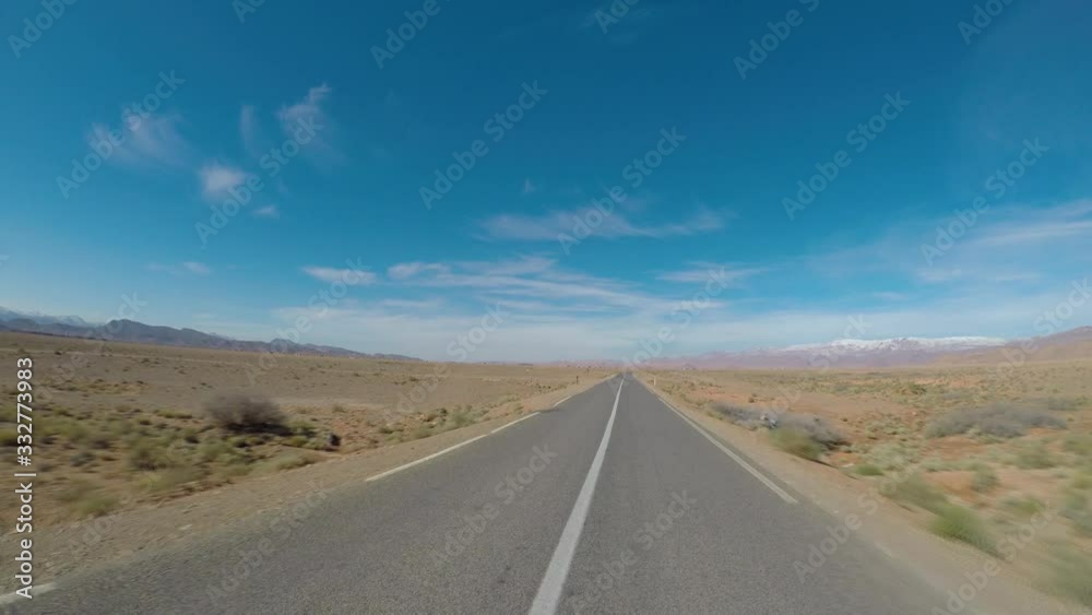POV Camera car on empty mountain road. Atlas mountain path in Morocco POV Camera car on empty mountain road. Atlas mountain path in Morocco