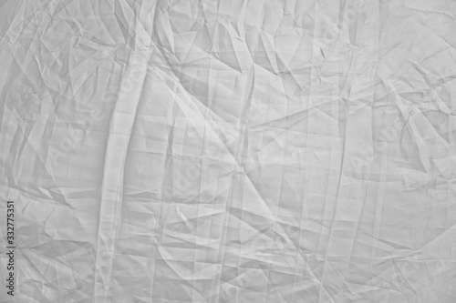 light background  Crumpled fabric  black and white  enhanced contrast