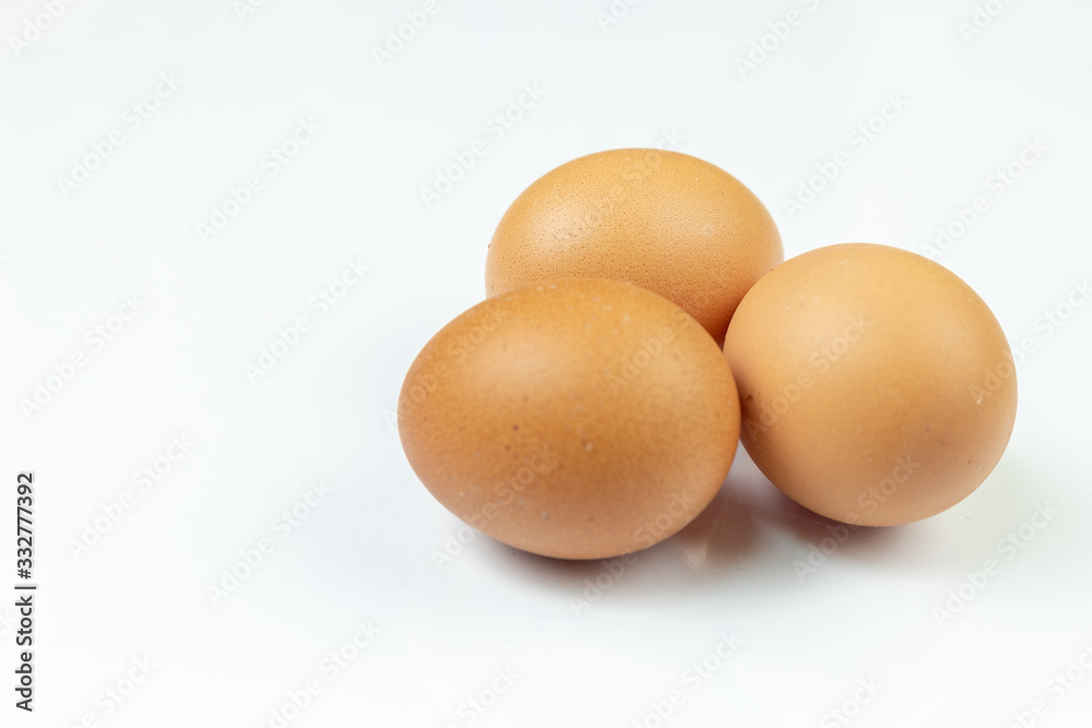 Three Chicken Eggs Isolated Above White Background Three Chicken Eggs Isolated Above White Background