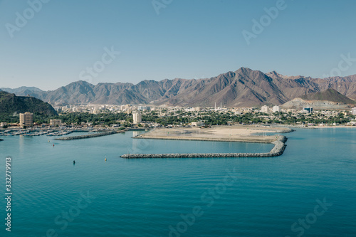 Landscape view to empty Khorfakkan Port from cruise ship. Sharjah, UAE photo