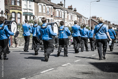 Brass band of young people . View from back .Carnaval parade in Dover, UK, England photo