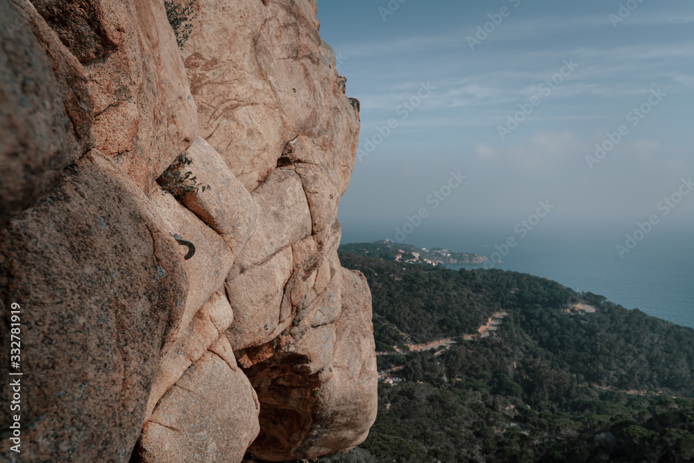Rock Climbing next to coast at mediterranian sea