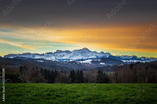 Fototapeta Naklejka Na Ścianę i Meble -  Alps mountains in Switzerland near the St. Gallen at sunrise