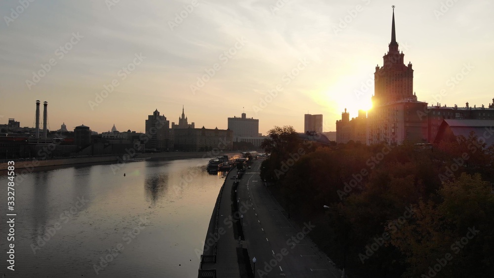 Morning aerial view on Moscow city with river and manufacture. Russian Government House of Russia on the background