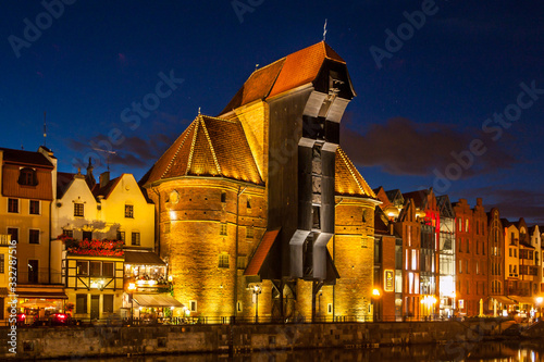 Gdansk Old Town and famous crane on River Motlawa embankment by night, Poland