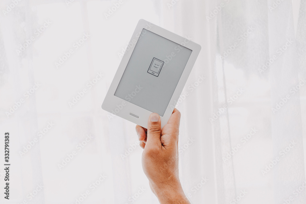 hand hold reader white wall hand hold reader white wall