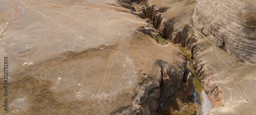 Aerial image of a small canyon in the Ak-Sai valley on the way to Kol Suu photo