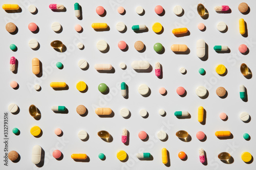 Fotografie Colorful assorted pills pattern flat lay of medicine pills colorful medicine on dark background