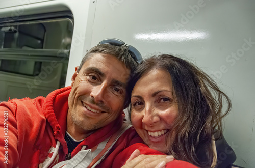 Happy couple taking selfie on the subway train © jovannig