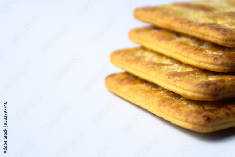Close up healthy wheat cracker on white background. Cracker biscuit Close up healthy wheat cracker on white background. Cracker biscuit