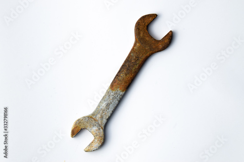 Wrench rusty in white isolated background