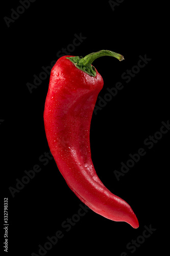Pepper on black background