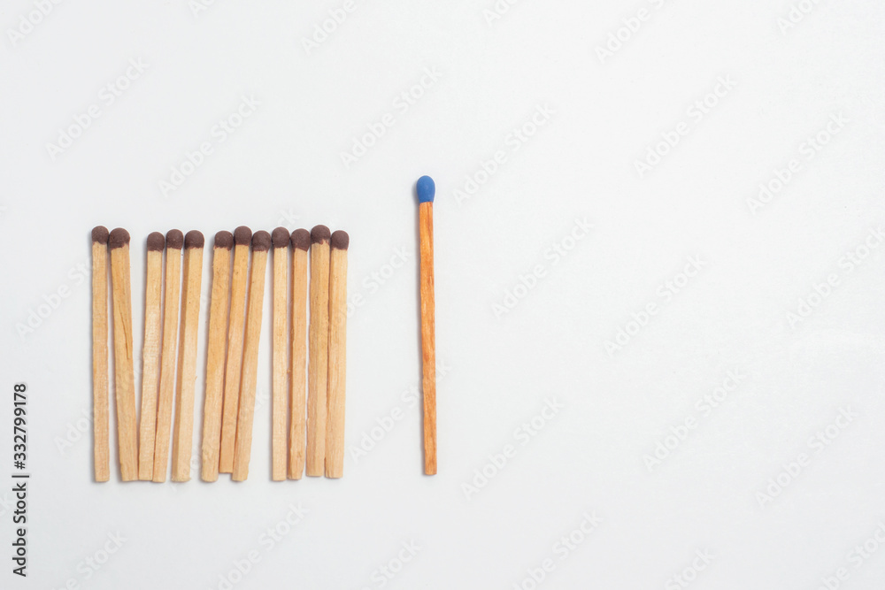 A crowd of twelve brown- headed matches stand in front of a long blue head . A n abstract concept o f individuality , an Apostle, a teacher, a boss, a politician. A crowd of twelve brown- headed matches stand in front of a long blue head . A n abstract concept o f individuality , an Apostle, a teacher, a boss, a politician.