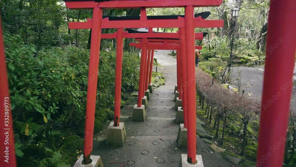 Forward gimbal movement through Torii gates in Kenrokuen garden in winter Kanazawa, Japan Forward gimbal movement through Torii gates in Kenrokuen garden in winter Kanazawa, Japan