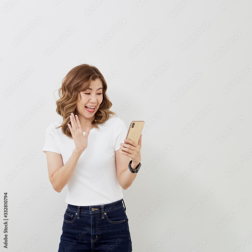 A Cheerful girl using smartphone A Cheerful girl using smartphone