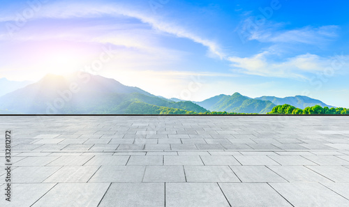 Empty square floor and green tea mountain nature landscape at sunset,panoramic view.