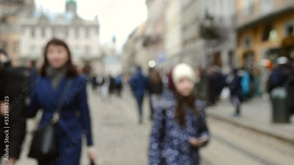Blurred Background of many people on street square city town. Blurred Background of many people on street square city town.